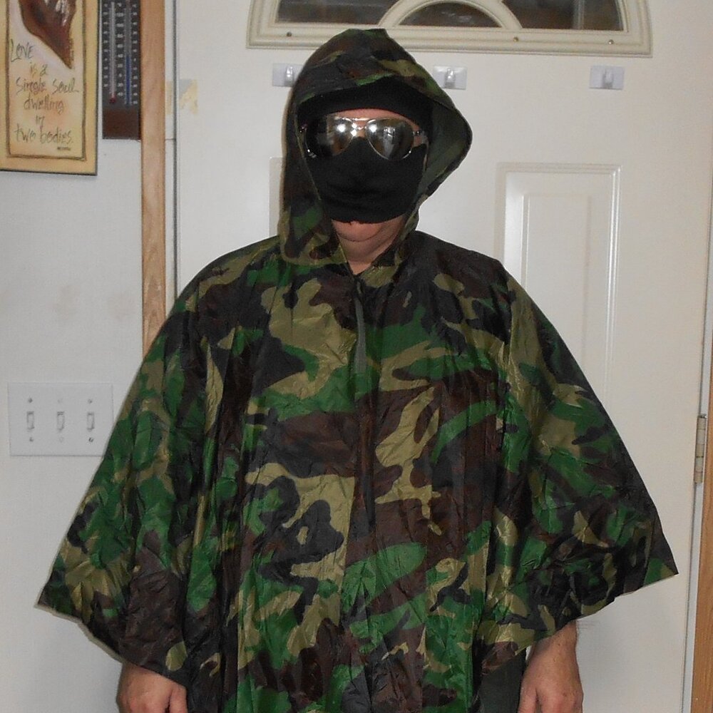 New Camouflage Poncho Raincoat - One Size Fits All.